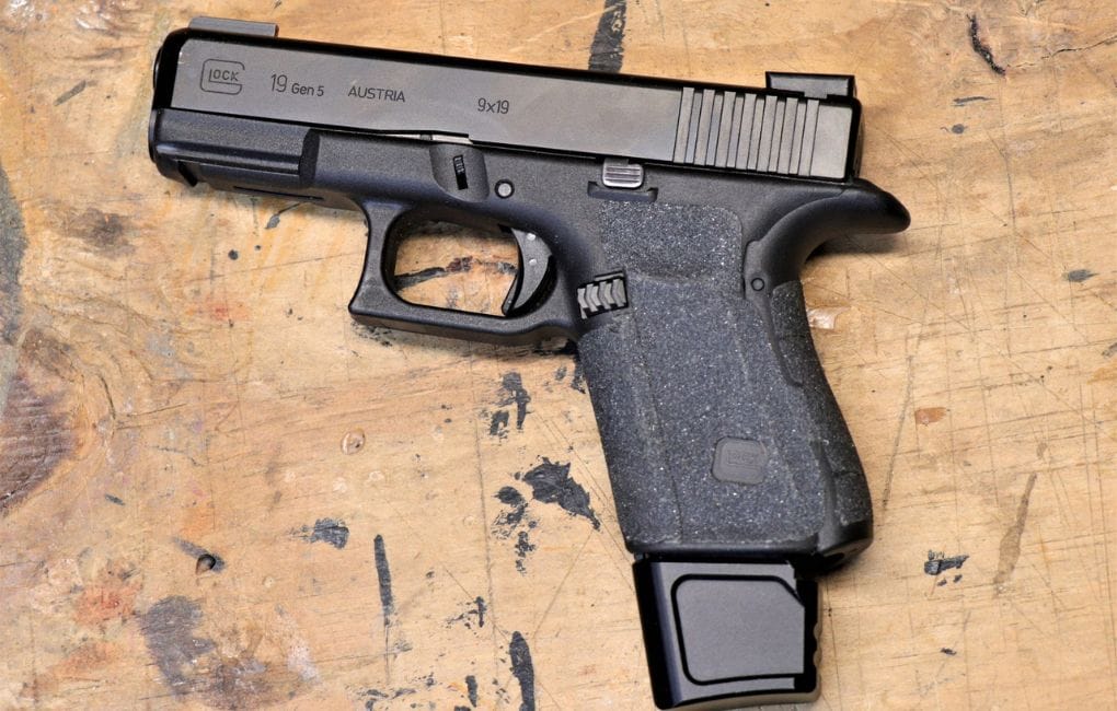 Glock Magazine Extension vs. Standard Magazine